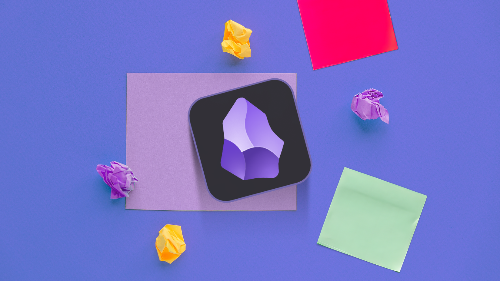Logotipo do aplicativo Obsidian em um post-it cercado por bolas de papel amassadas e notas coloridas