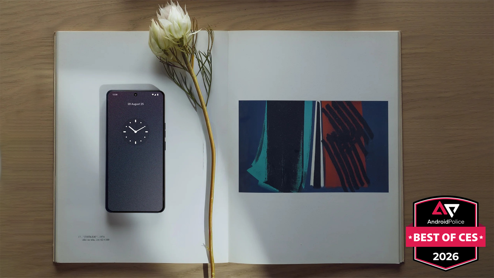 Punkt on a background of a desk with a flower