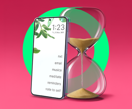 Smartphone displaying a minimalist text-only home screen leaning against an hourglass.