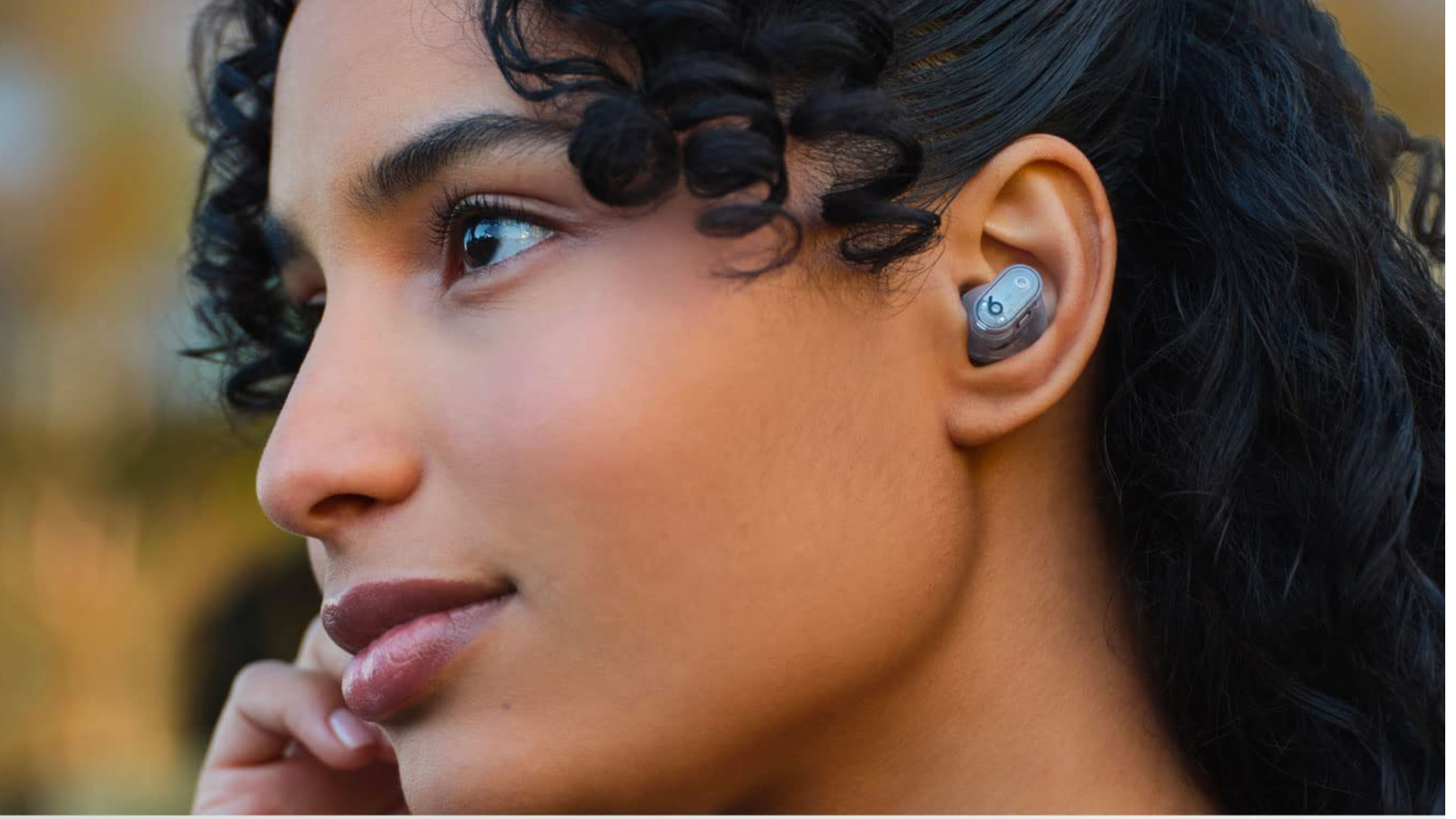 Person wearing Beats Studio Buds +