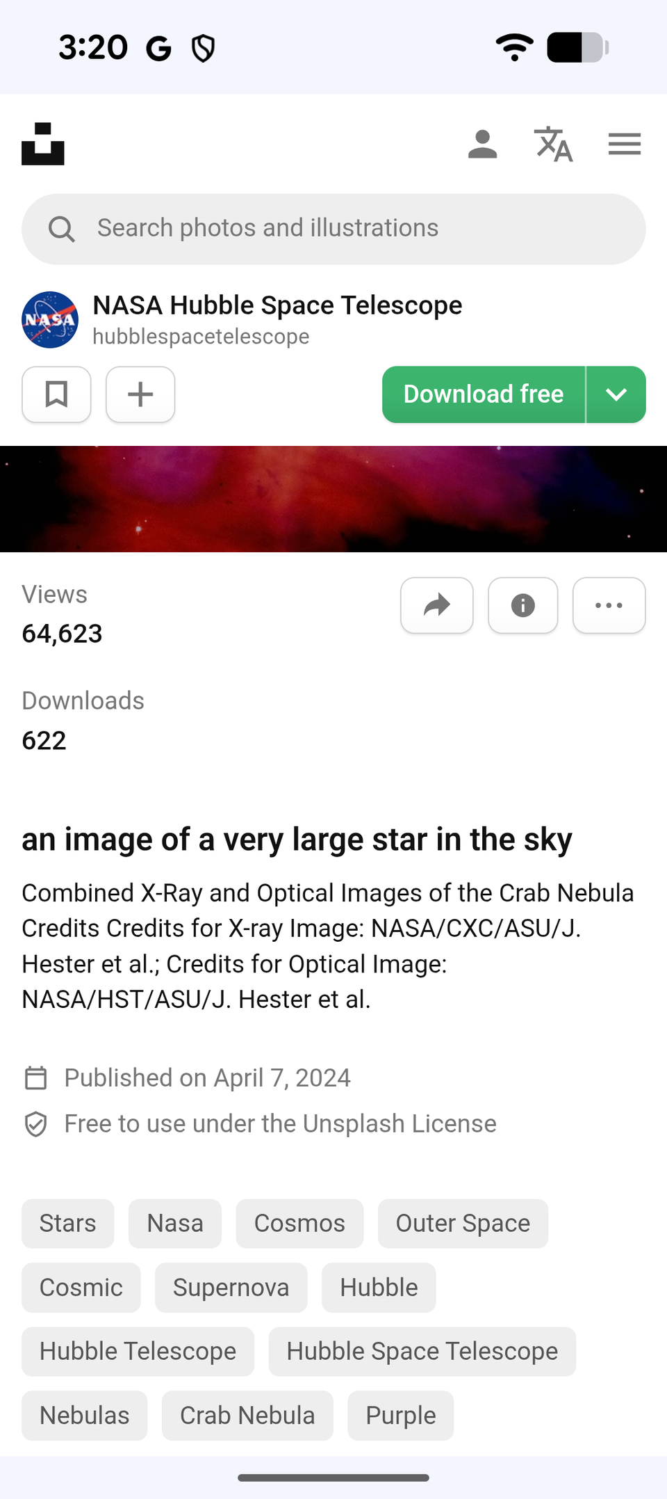 Uno screenshot da Unsplash con le specifiche di una foto di nebulosa