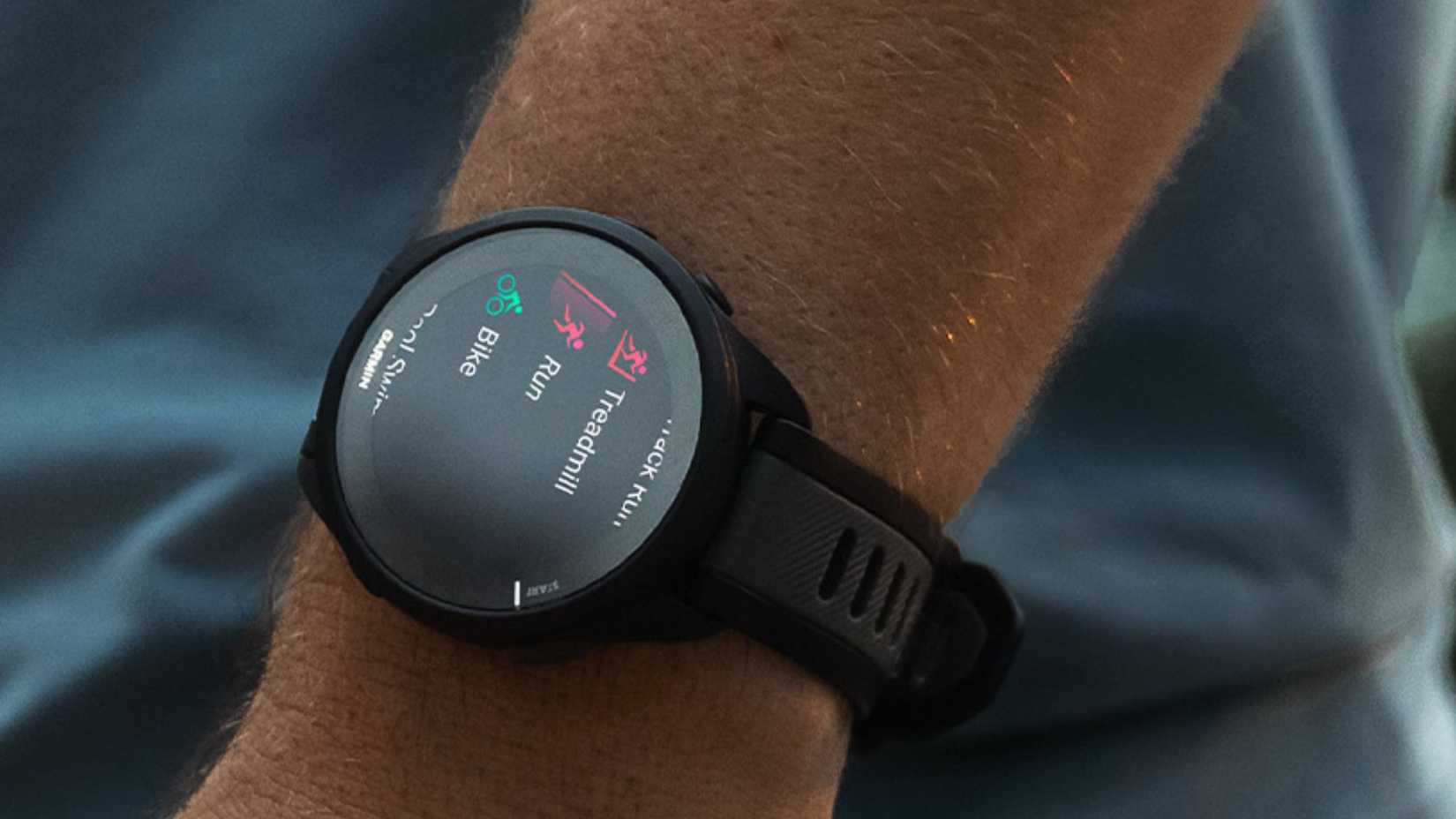 Person wearing Garmin Forerunner 165