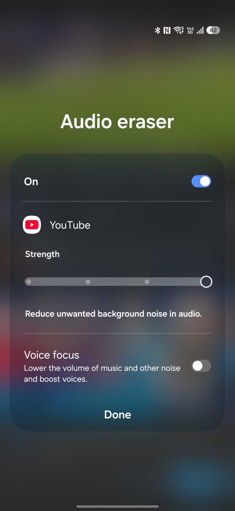 Audio eraser strength slider set high with voice focus toggle visible
