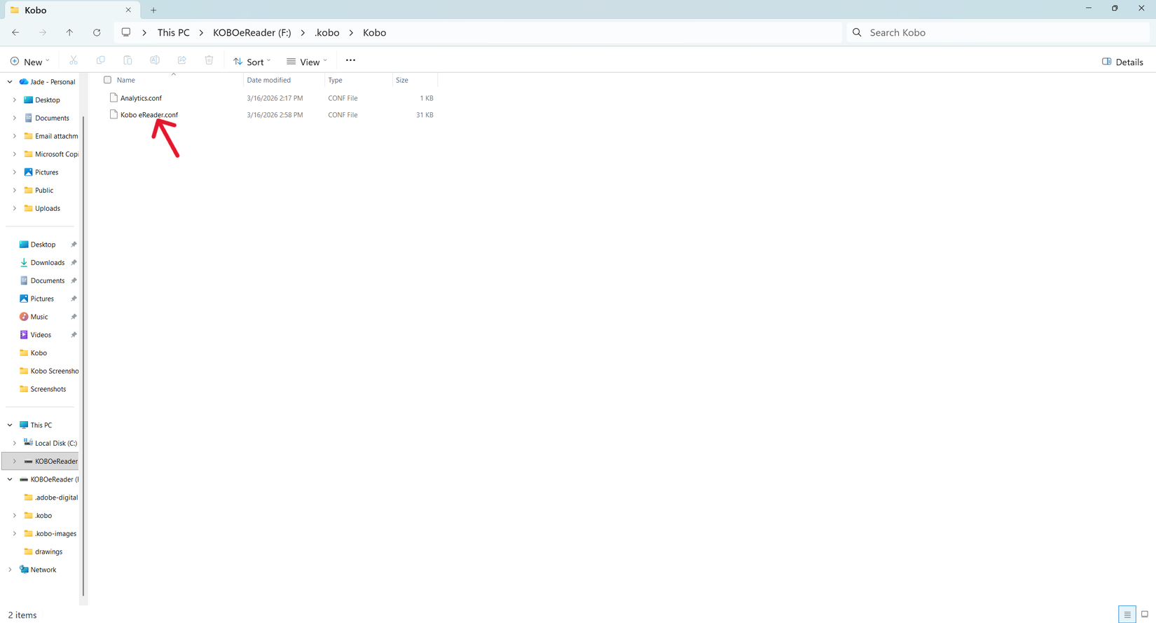 Uma captura de tela do Windows File Explorer aberta em Arquivos da Kobo, com uma seta vermelha apontando para 