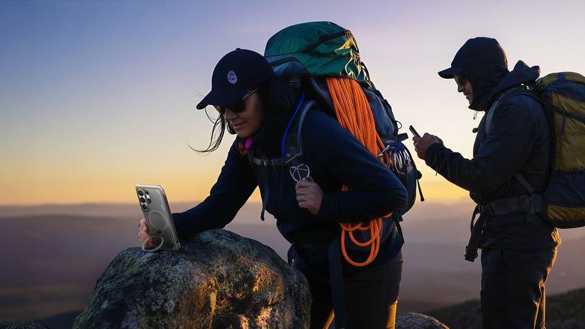 Woman on a hike using the magnetic kickstand on the TORRAS Ostand Q3 Air for Samsung Galaxy S26 Ultra