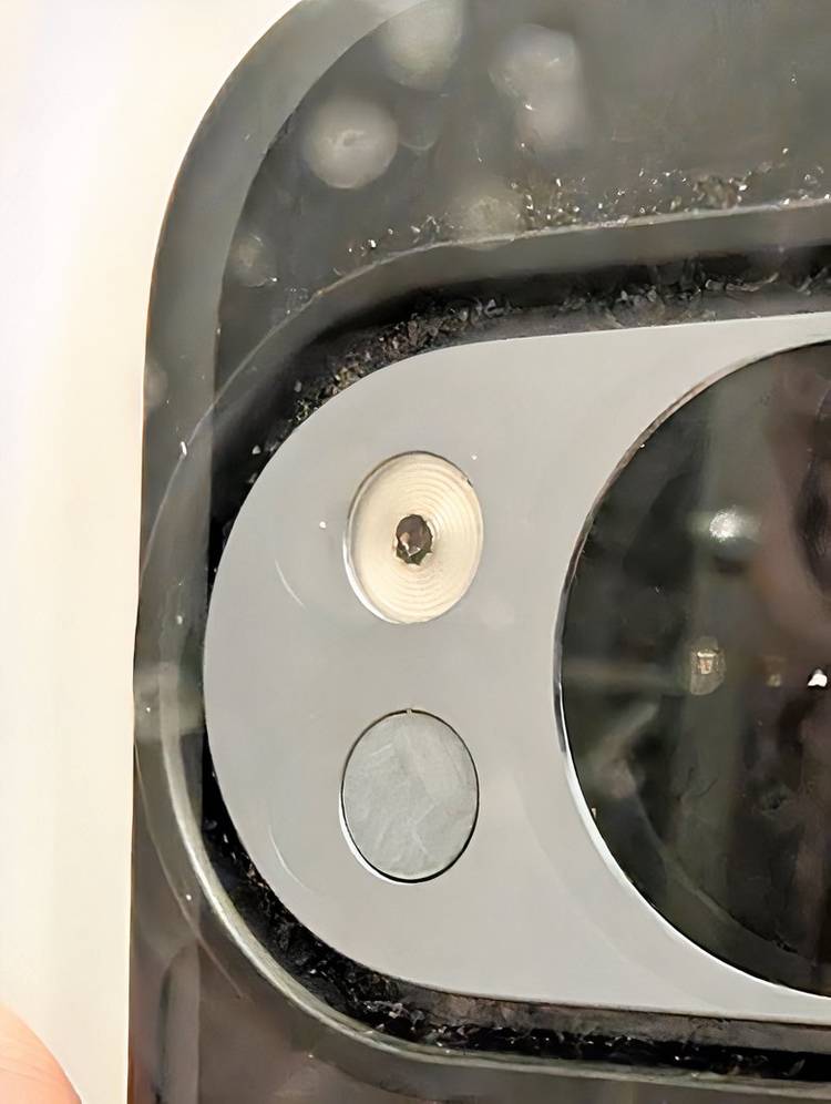 a black google pixel 10 pro with a burnt camera lens