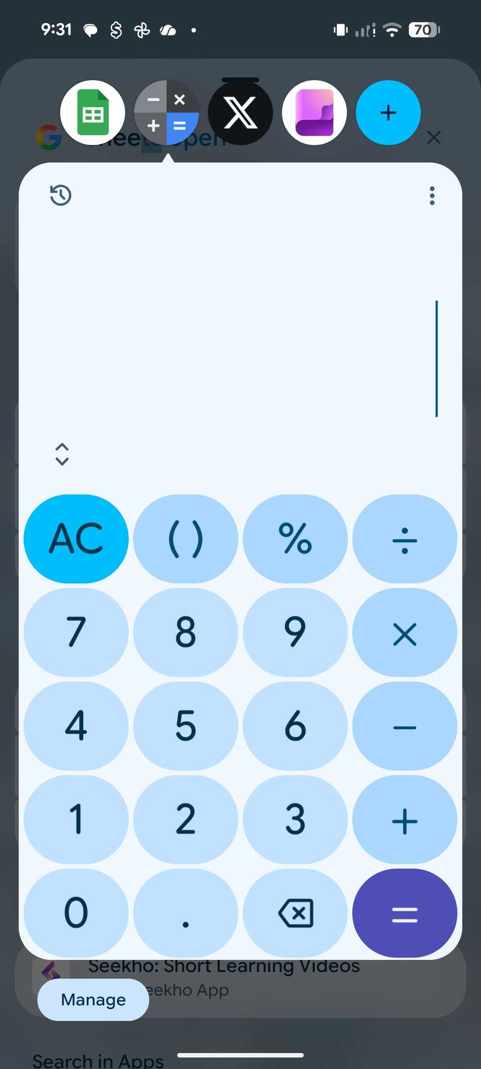 Calculator in multitasking bubble on Pixel 8 running Android 17