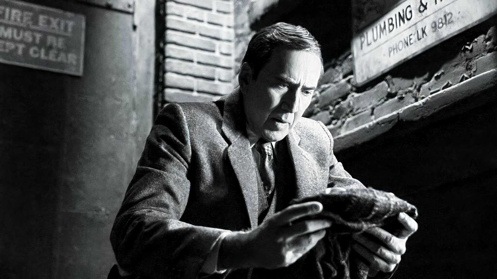 Nicolas Cage in Spider-Noir, in a monochrome shot.