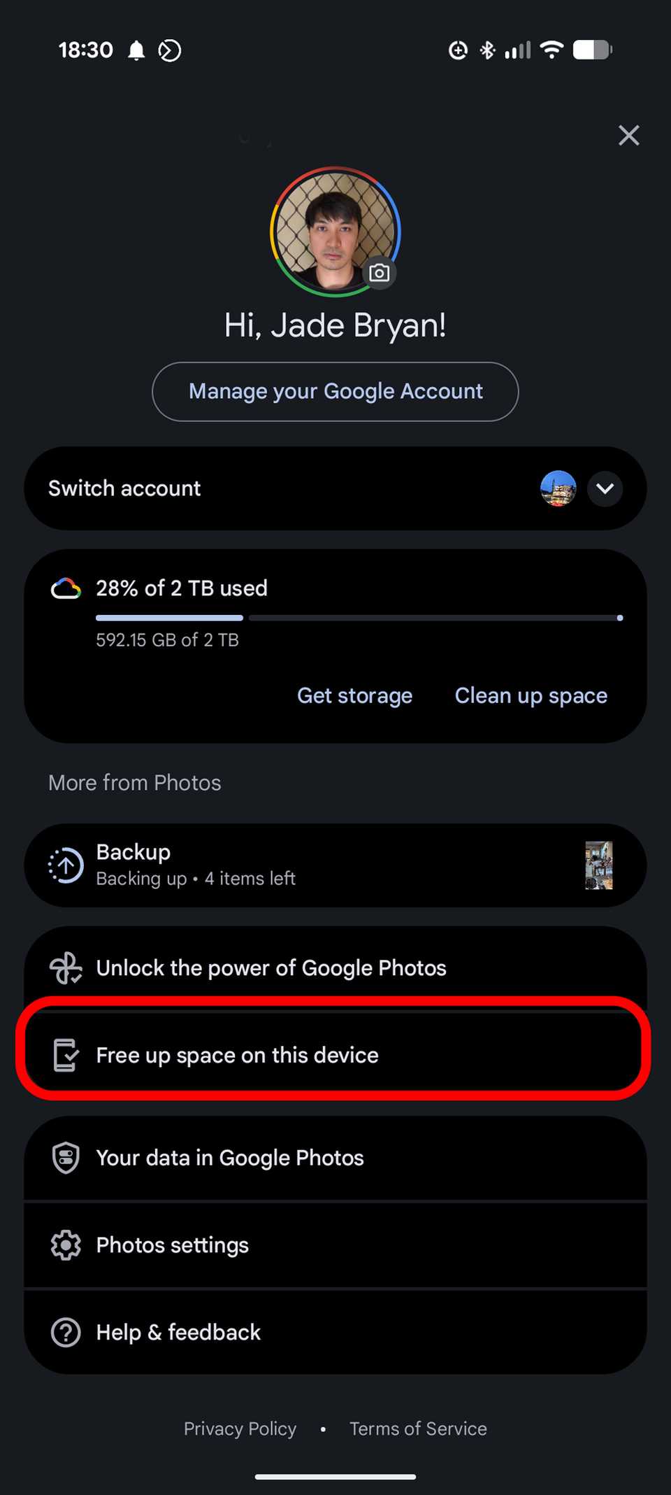 The settings page of Google Photos where the Free up space on this device feature is located