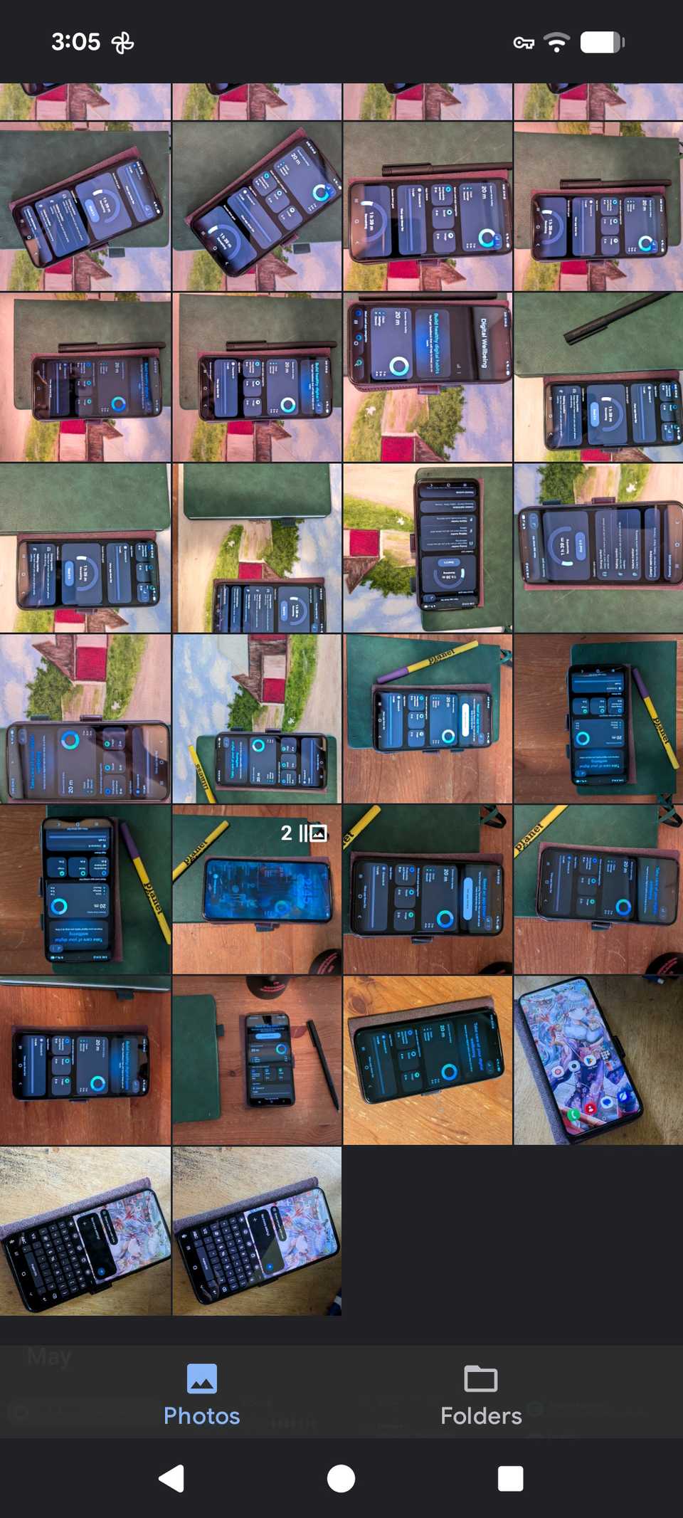 Photos section in Gallery by Google app showing a grid of photos