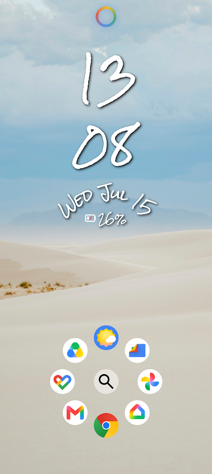 wallpaper of sandy dunes and blue sky with apps at bottom of screen in circular layout