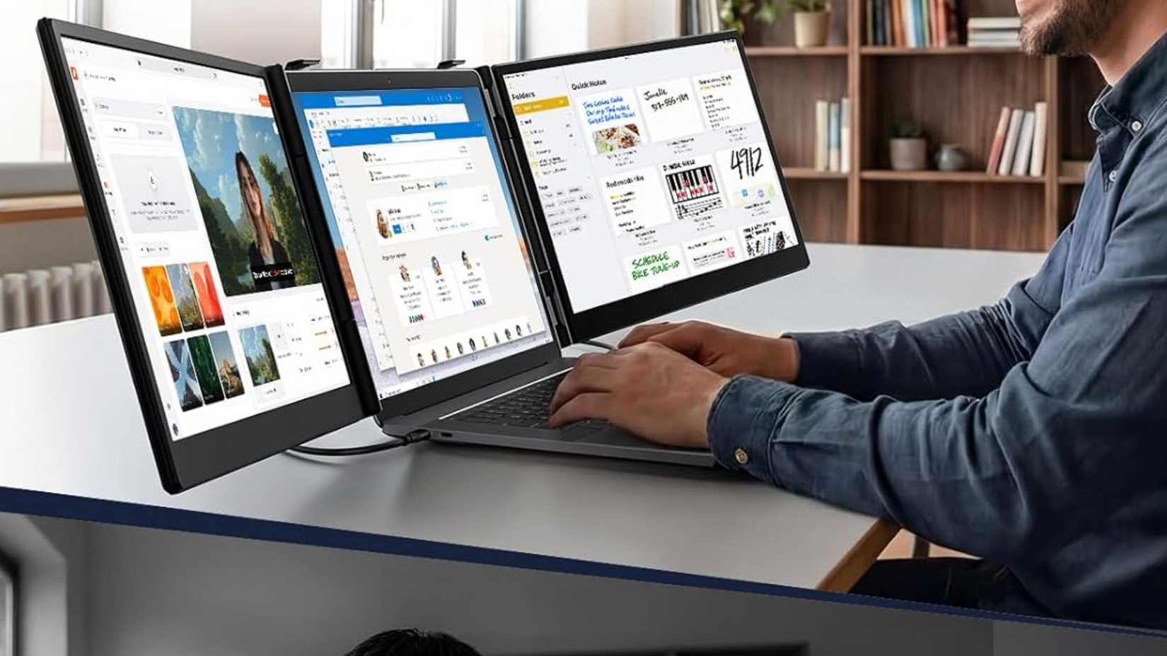 Person using Vixtan 14" Triple Laptop Screen Extender on laptop