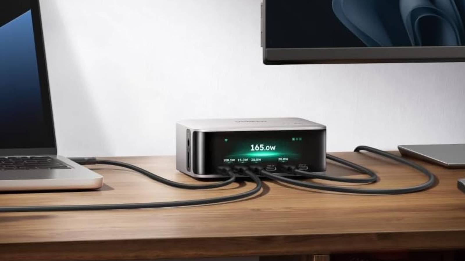 UGREEN Nexode Pro 300W Charging Station on desk plugged into devices