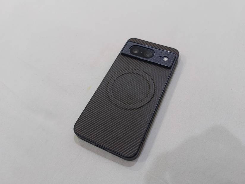 Brown textured magnetic case with diagonal pattern on Google Pixel 8 smartphone