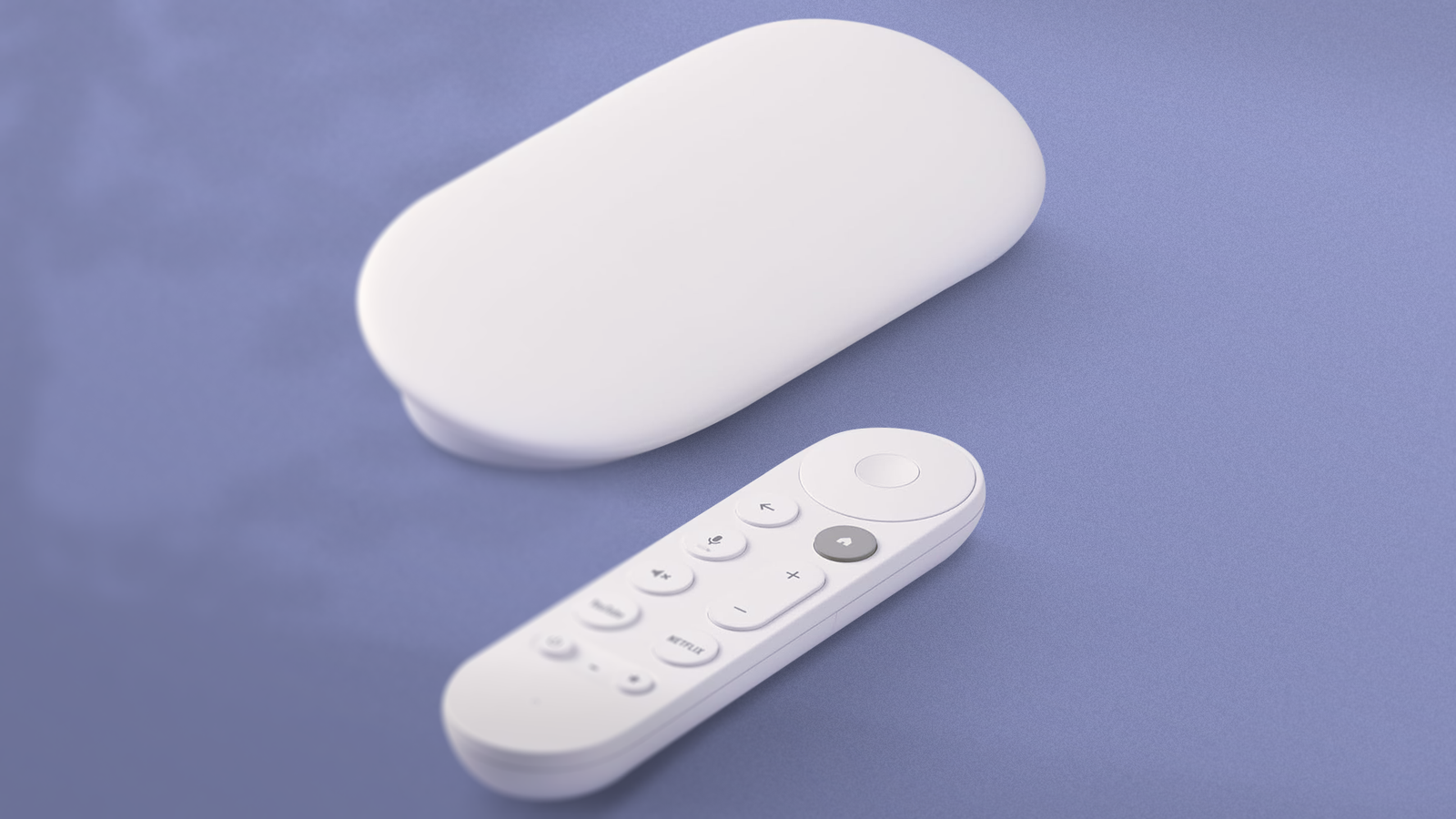 Google TV Streamer and remote on a blue background.