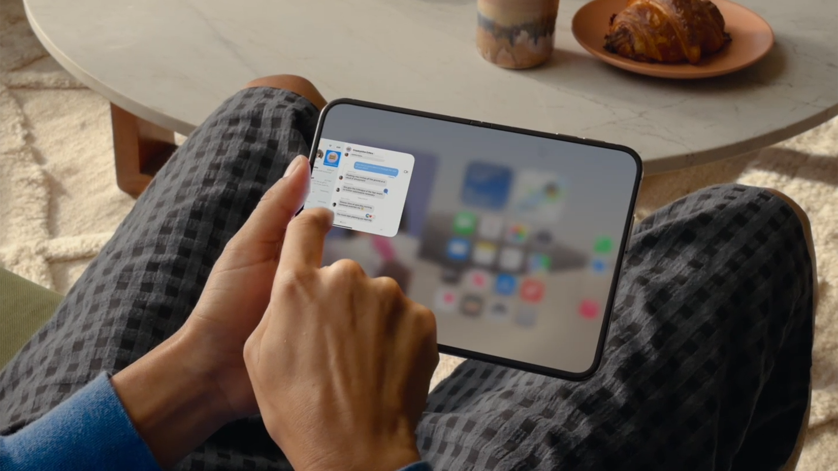 Apple iPhone Duo showing how to move an app to one side of the display