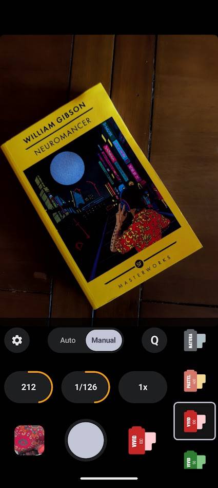 yellow book with camera settings and filter options around camera viewfinder