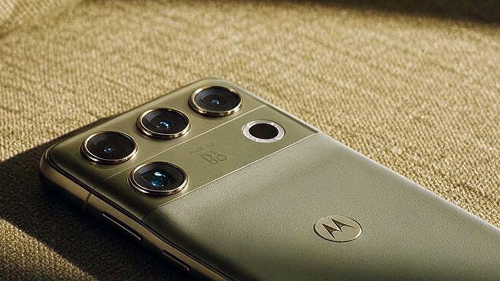Почему Motorola Signature 27 не привлекает пользователей Pixel Motorola Signature 27 зеленого цвета на твидовом фоне