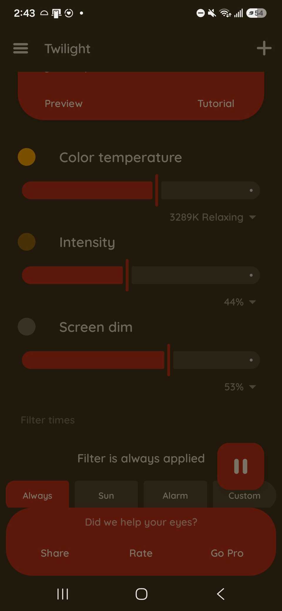 Using the dimming slider to make the screen go darker with blue light filtering in the twilight app