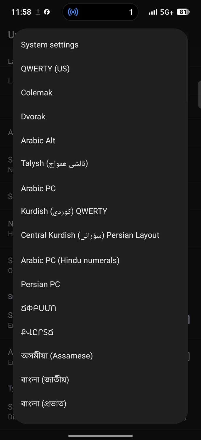 Keyboard layout selection menu listing QWERTY and multiple regional language options