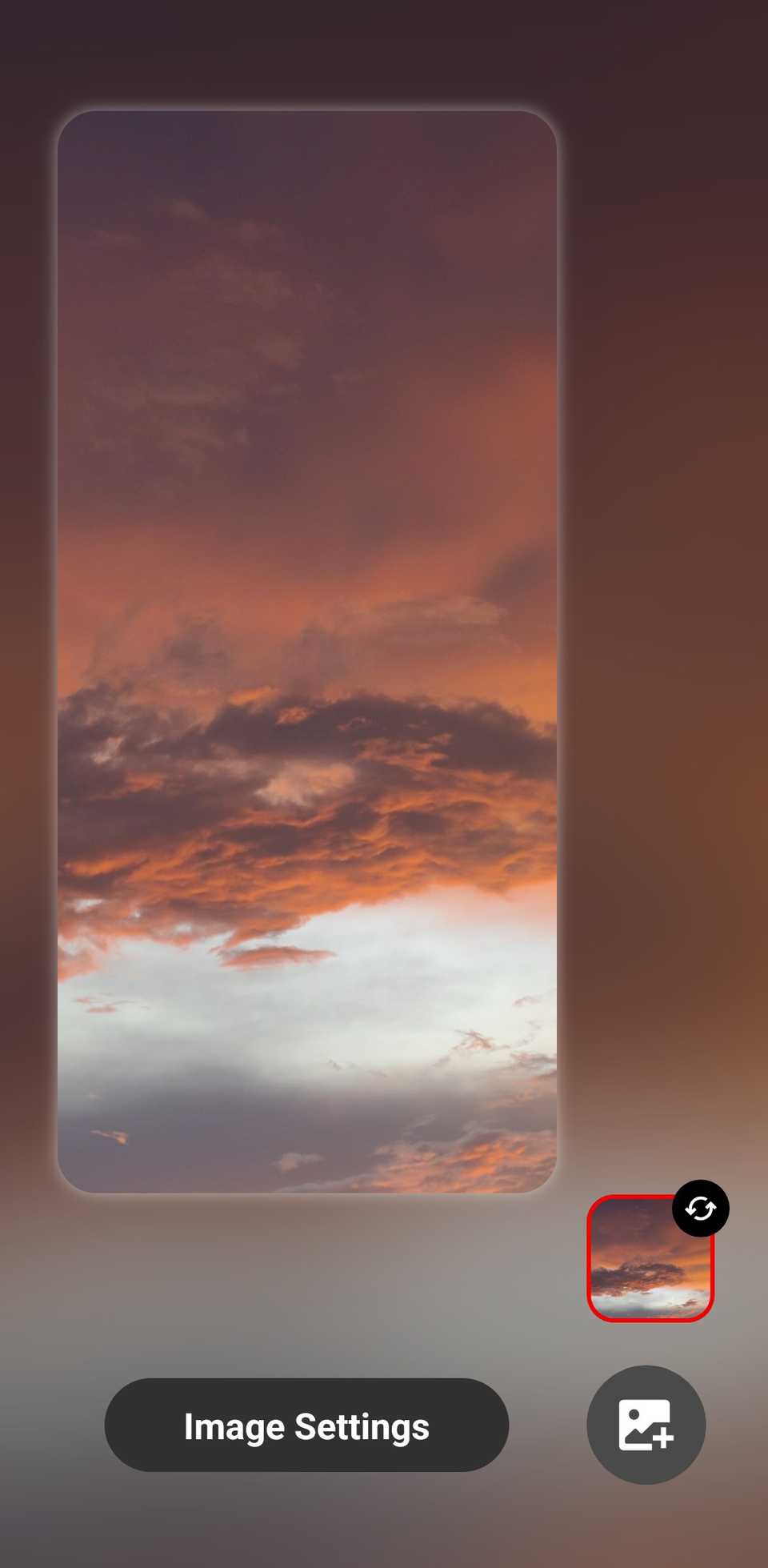 Wonderland wallpaper creation screen showing a sunset image as the background.