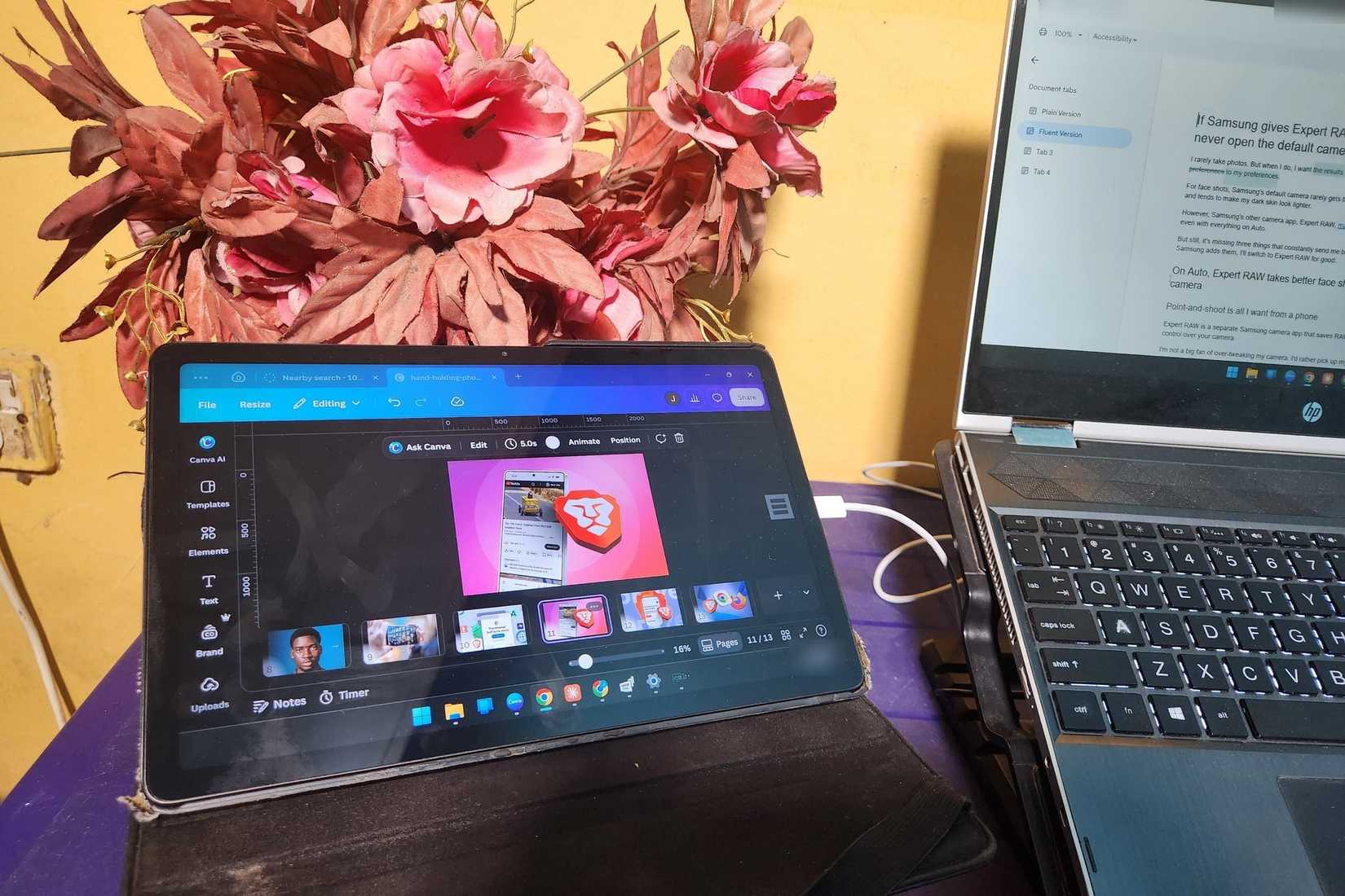 Xiaomi Redmi Pad in landscape on a folio-case stand, showing Canva as an extended display beside an HP laptop, with a USB cable between them