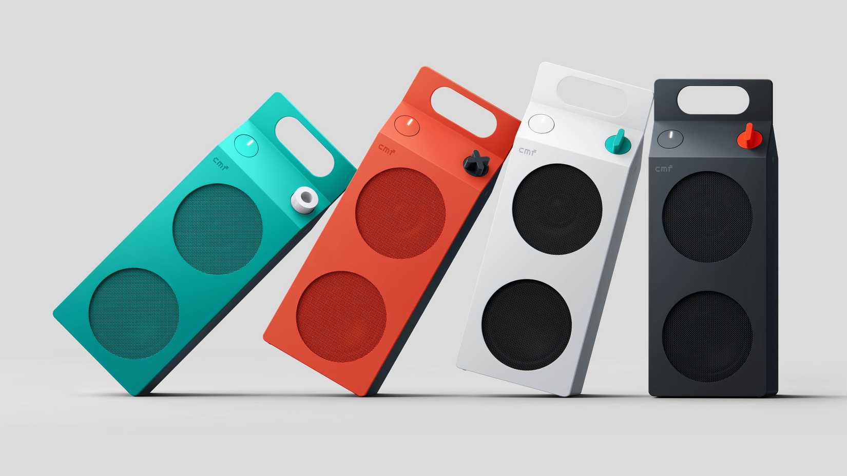 Four colorful CMF portable speakers in turquoise, orange, white, and dark grey leaning together