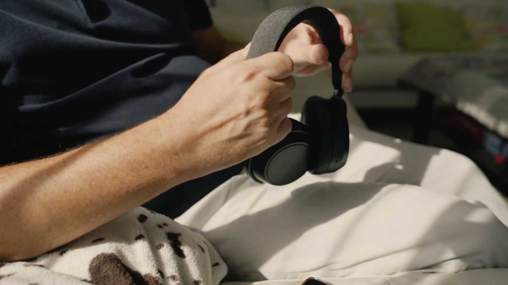 Person using Sennheiser Consumer Audio Momentum 4