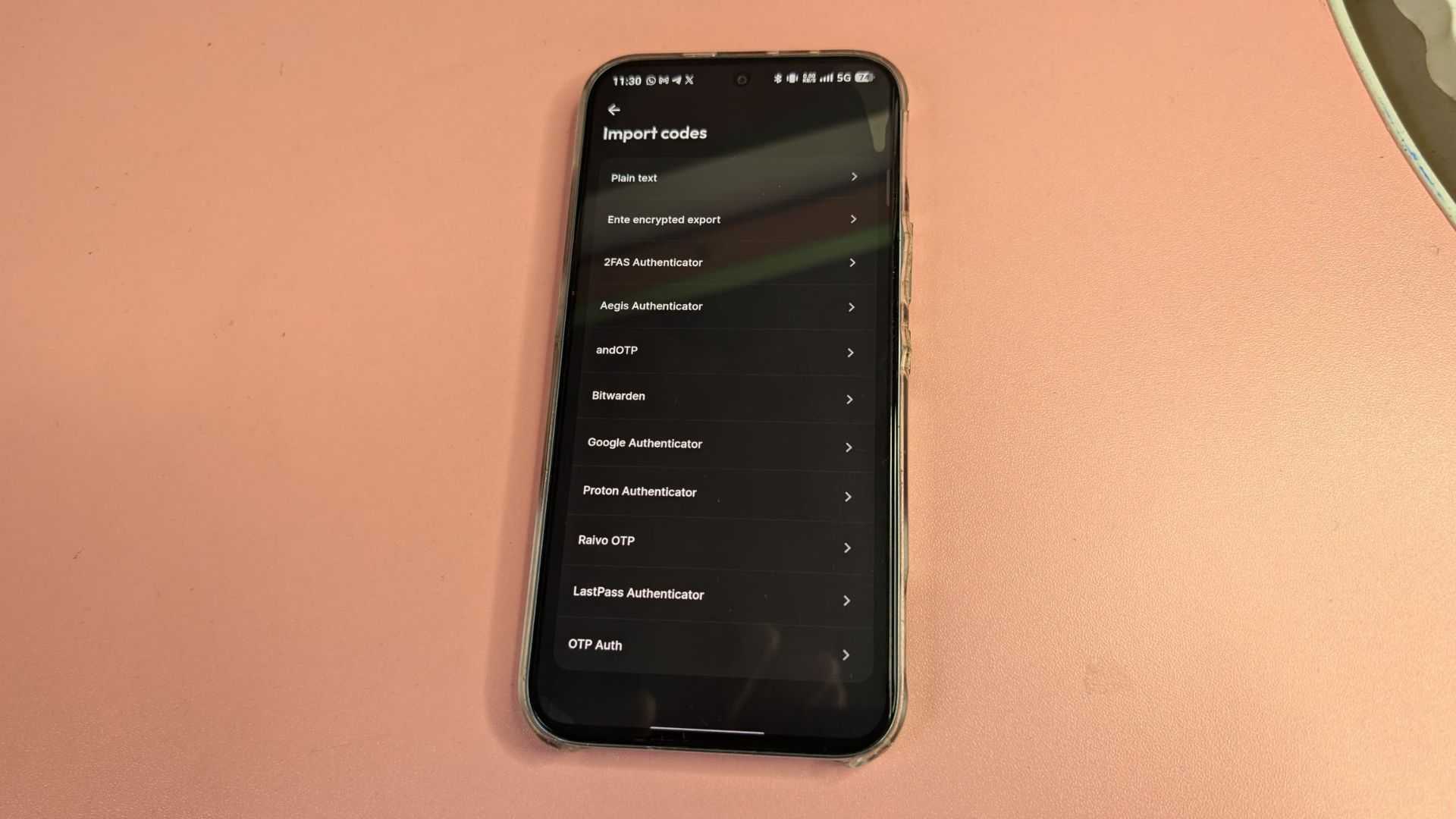 Android phone screen displaying Ente Auth import codes menu listing supported authenticators