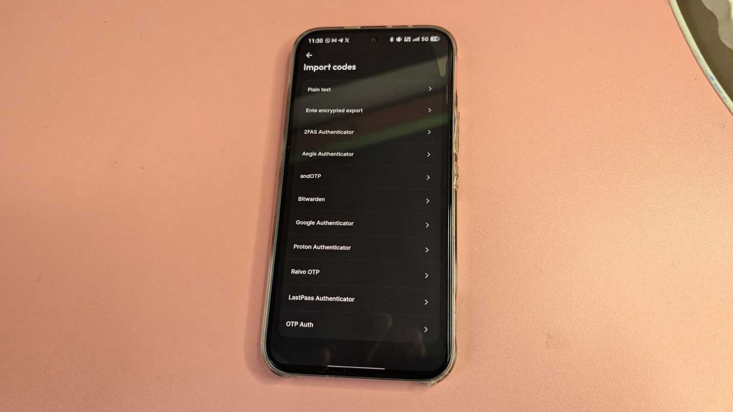 Android phone screen displaying Ente Auth import codes menu listing supported authenticators