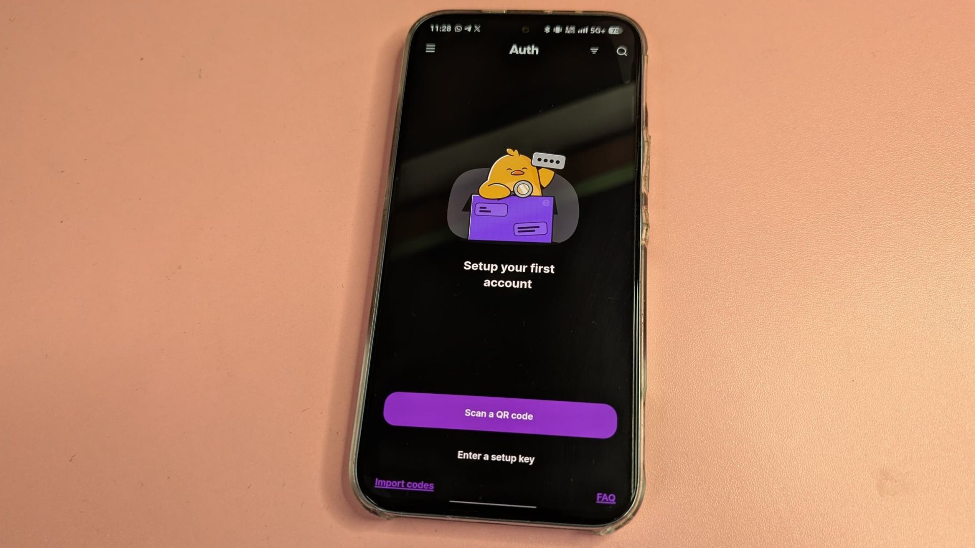 Ente Auth welcome screen on smartphone showing options to scan QR code or import codes