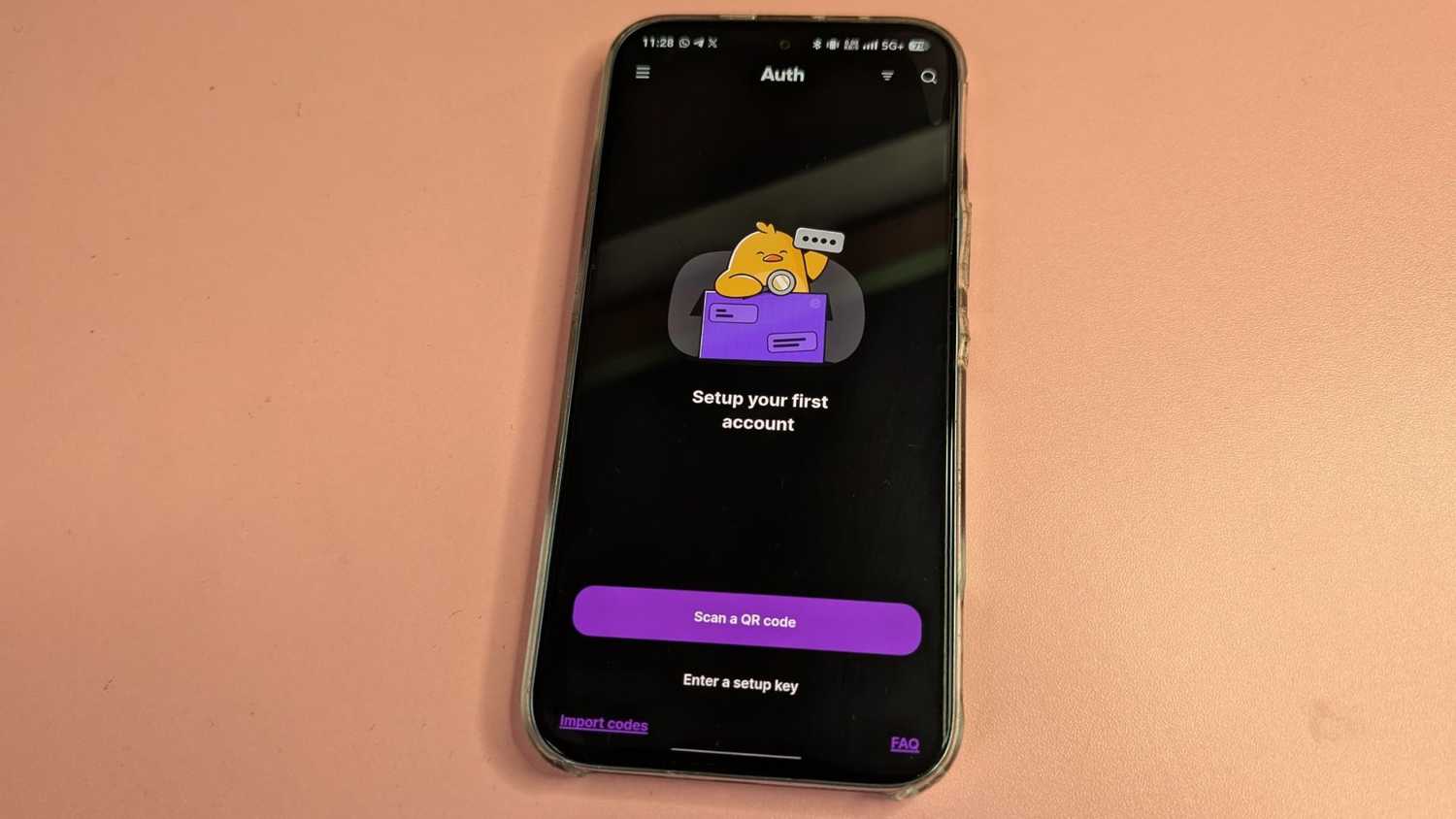 Ente Auth welcome screen on smartphone showing options to scan QR code or import codes