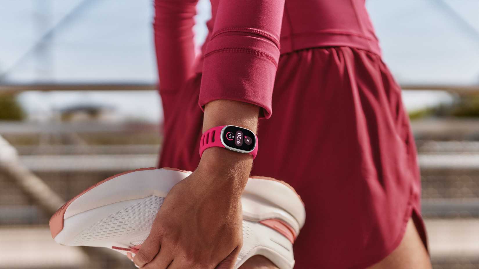Fitbit Edge on a runner's wrist.
