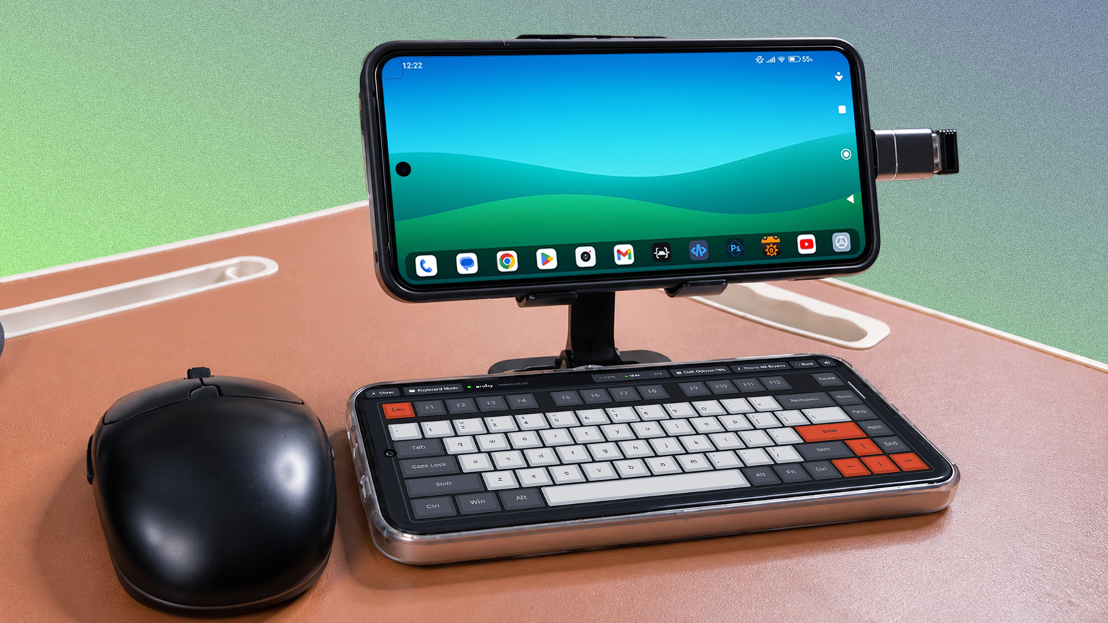 Google Pixel 8 running Dextop in a mini desktop setup with a second phone as a keyboard and a wireless mouse.