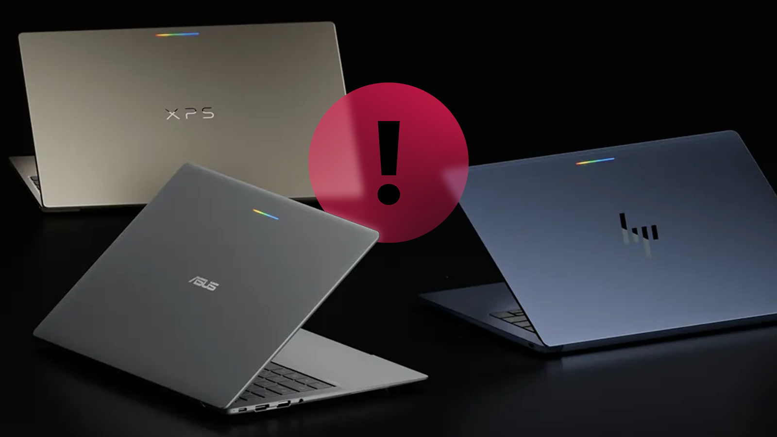 Googlebook laptops with a large warning icon between them.