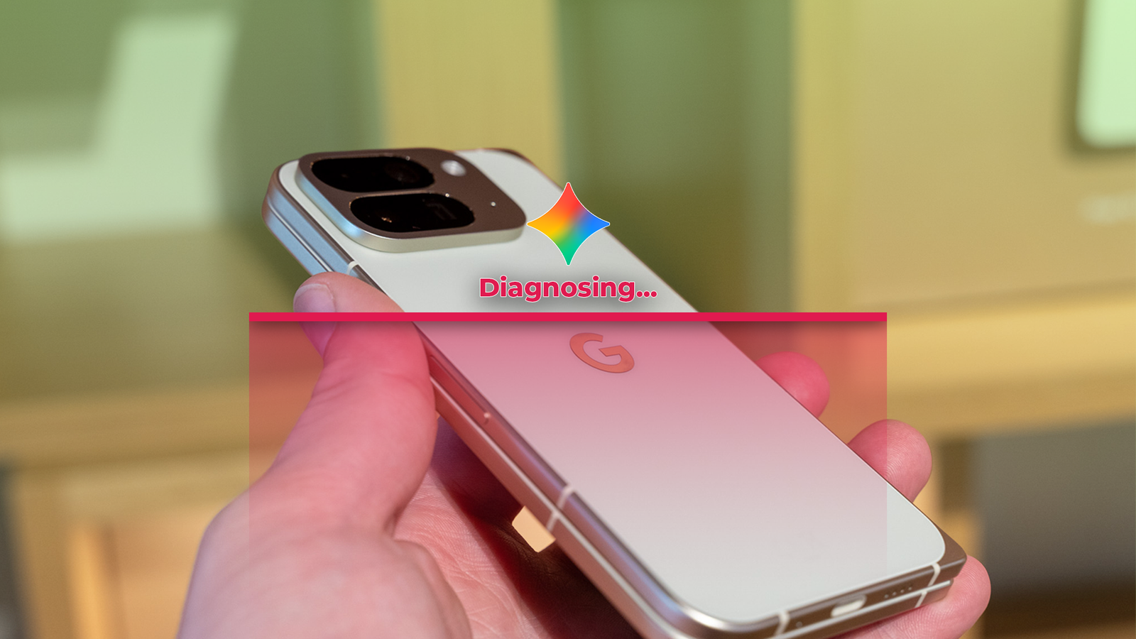 Hand holding a Google Pixel phone with a Gemini diagnosing overlay.