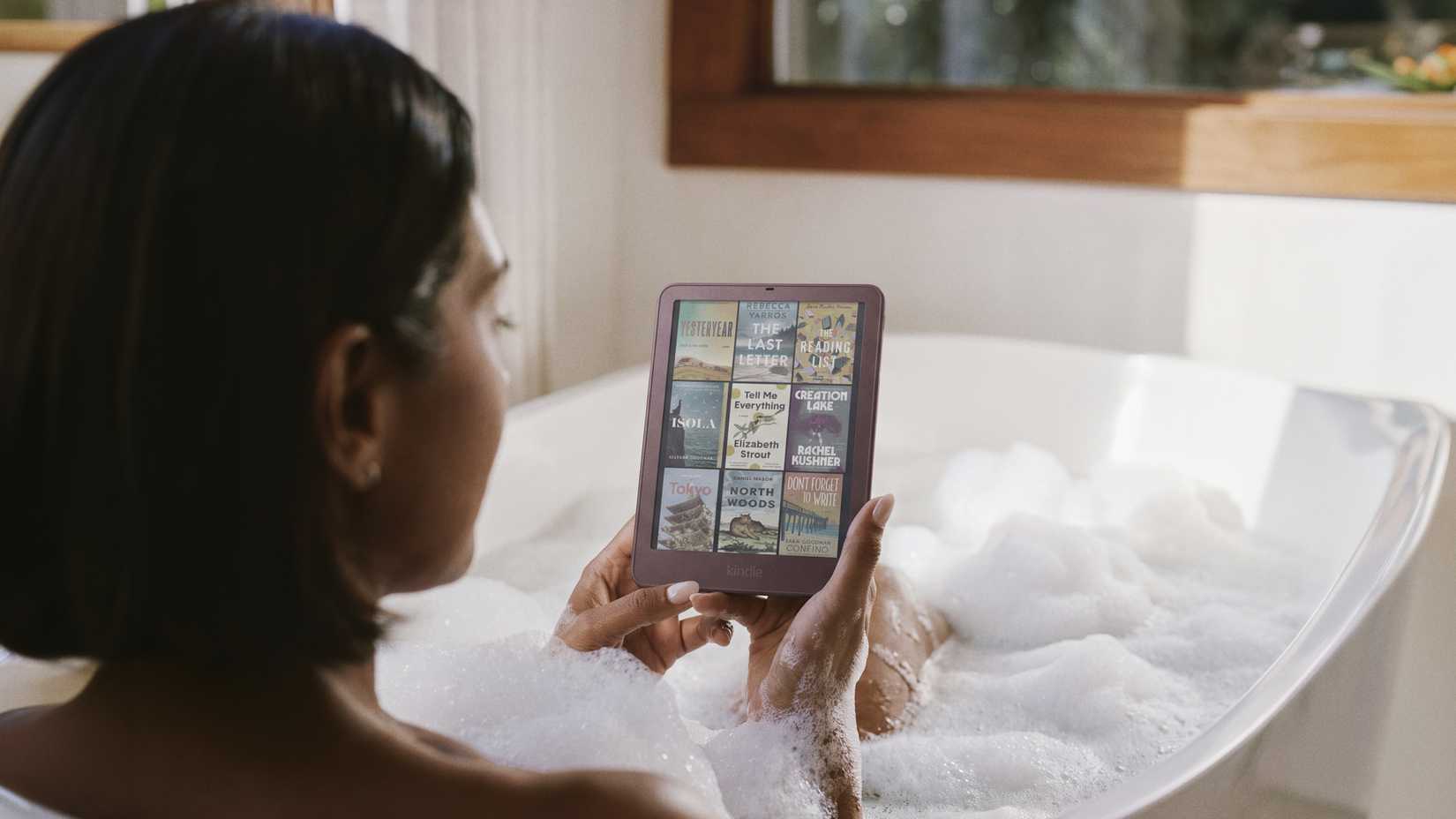 The Kindle Colorsoft Signature Edition being used in a bath.