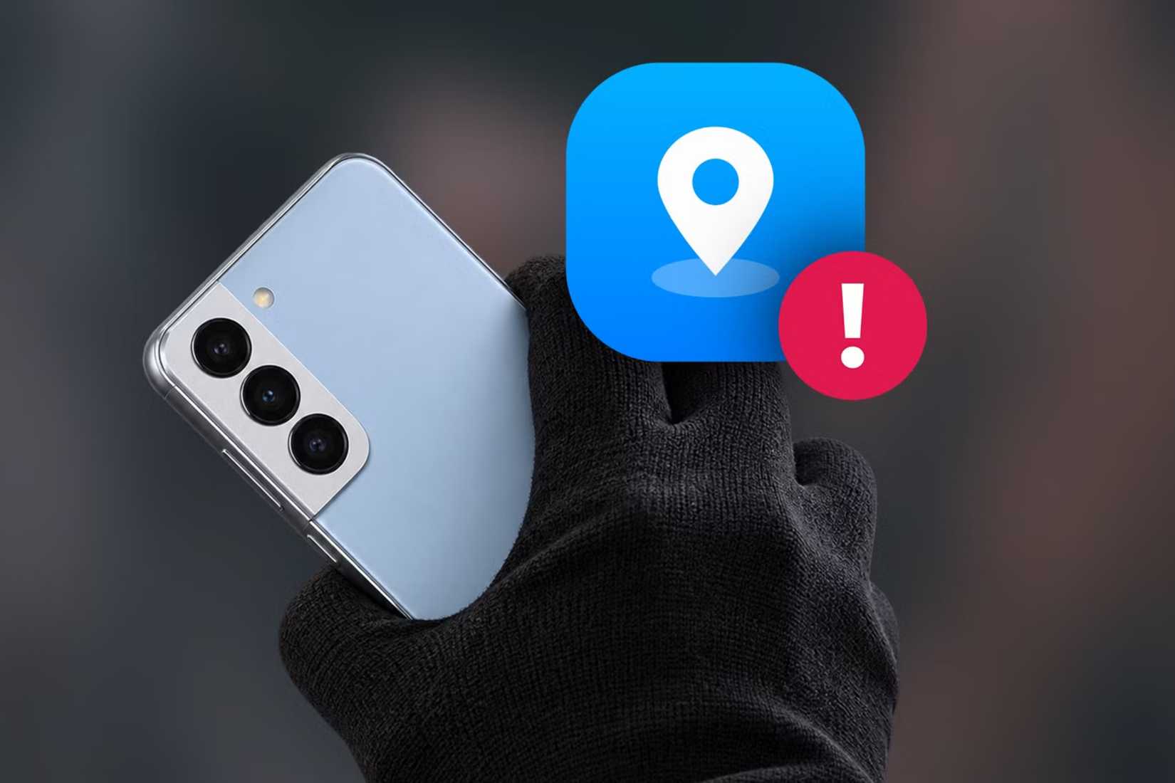 A hand in a black glove holding a light blue Samsung Galaxy phone next to the Samsung Find app icon with a red exclamation mark badge