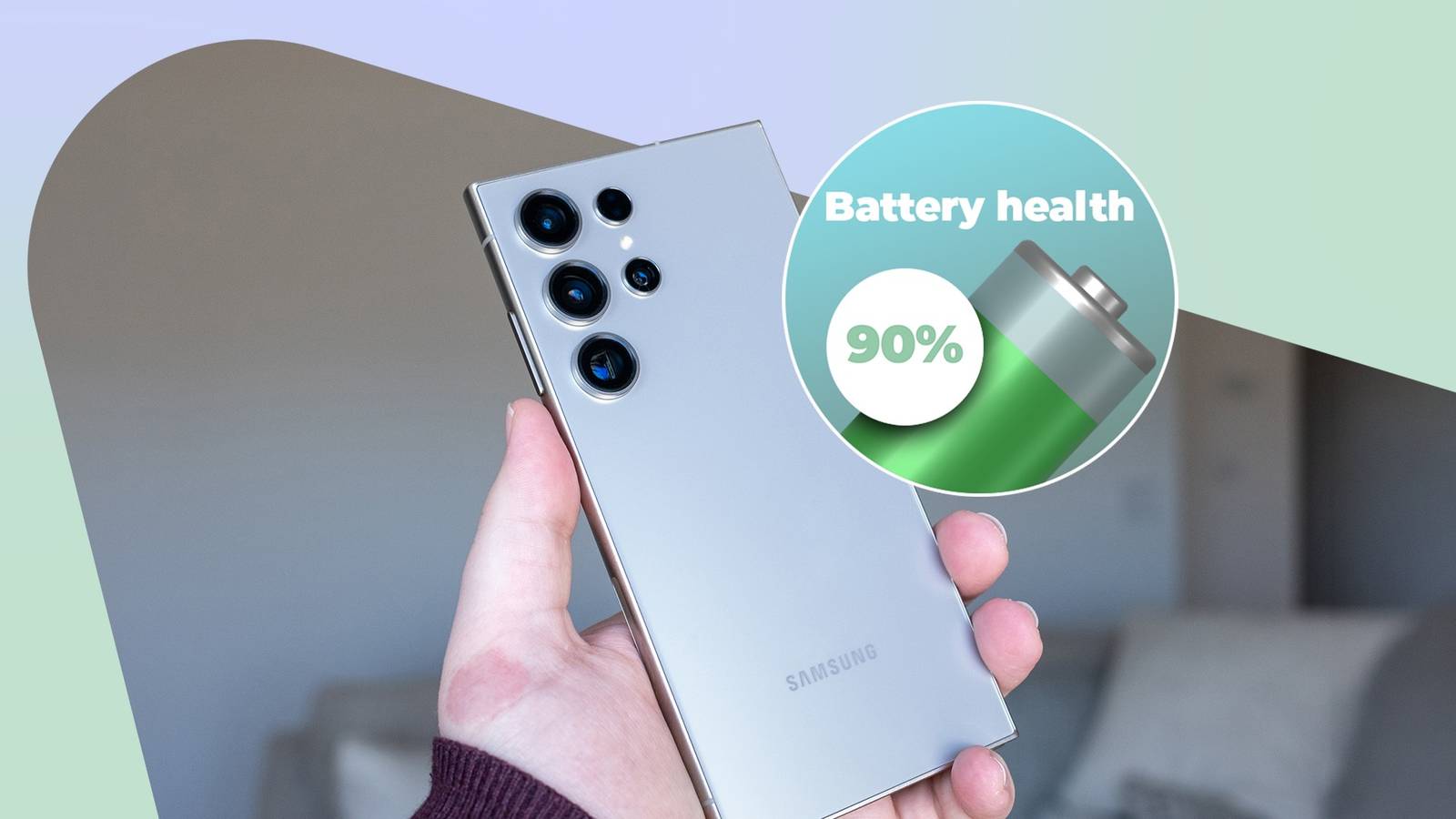 Samsung Galaxy S24 Ultra held in a hand, with a battery health indicator showing 90%.