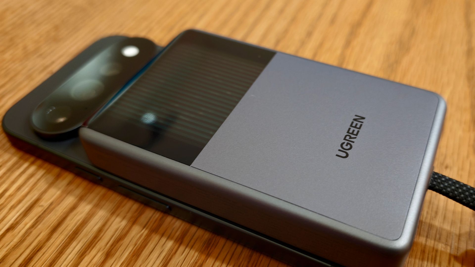 UGREEN Magflow Pro attached to the Pixel 11 Pro with liquid cooling animation active