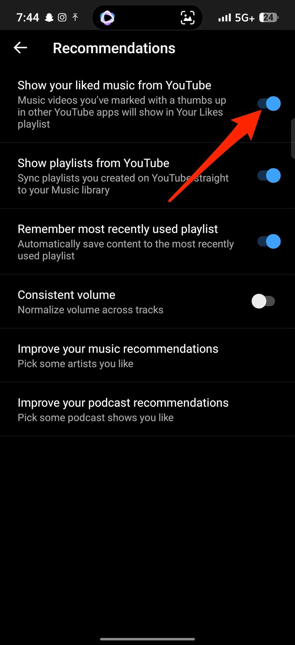 Red arrow pointing to Show your liked music from YouTube toggle in YouTube Music Recommendations settings