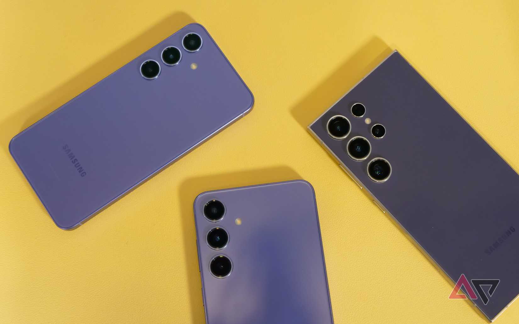All three Galaxy S24 models in purple on a yellow background.