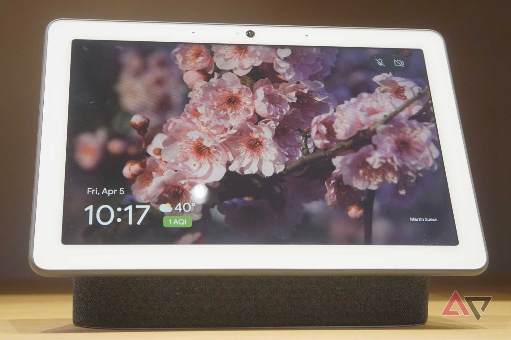 A Google Nest Hub Max tablet, docked.