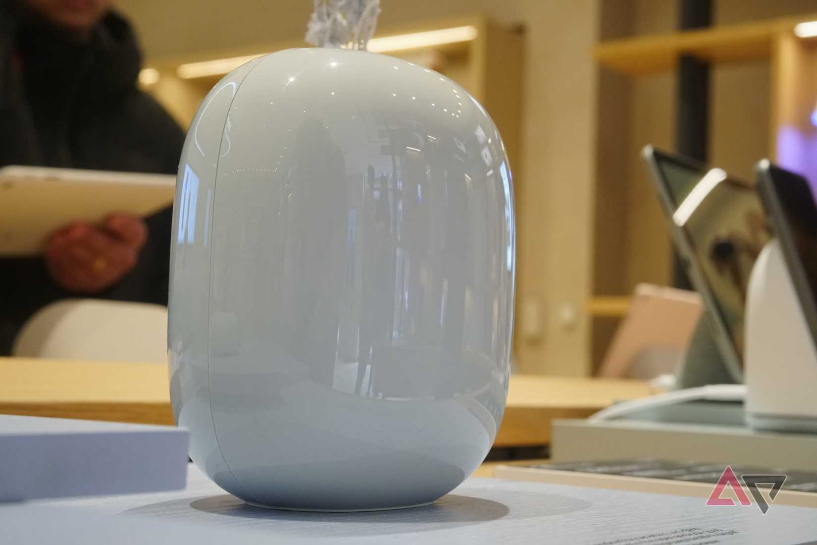 A blue Google Nest Wifi router on display at the Google Store in Boston.