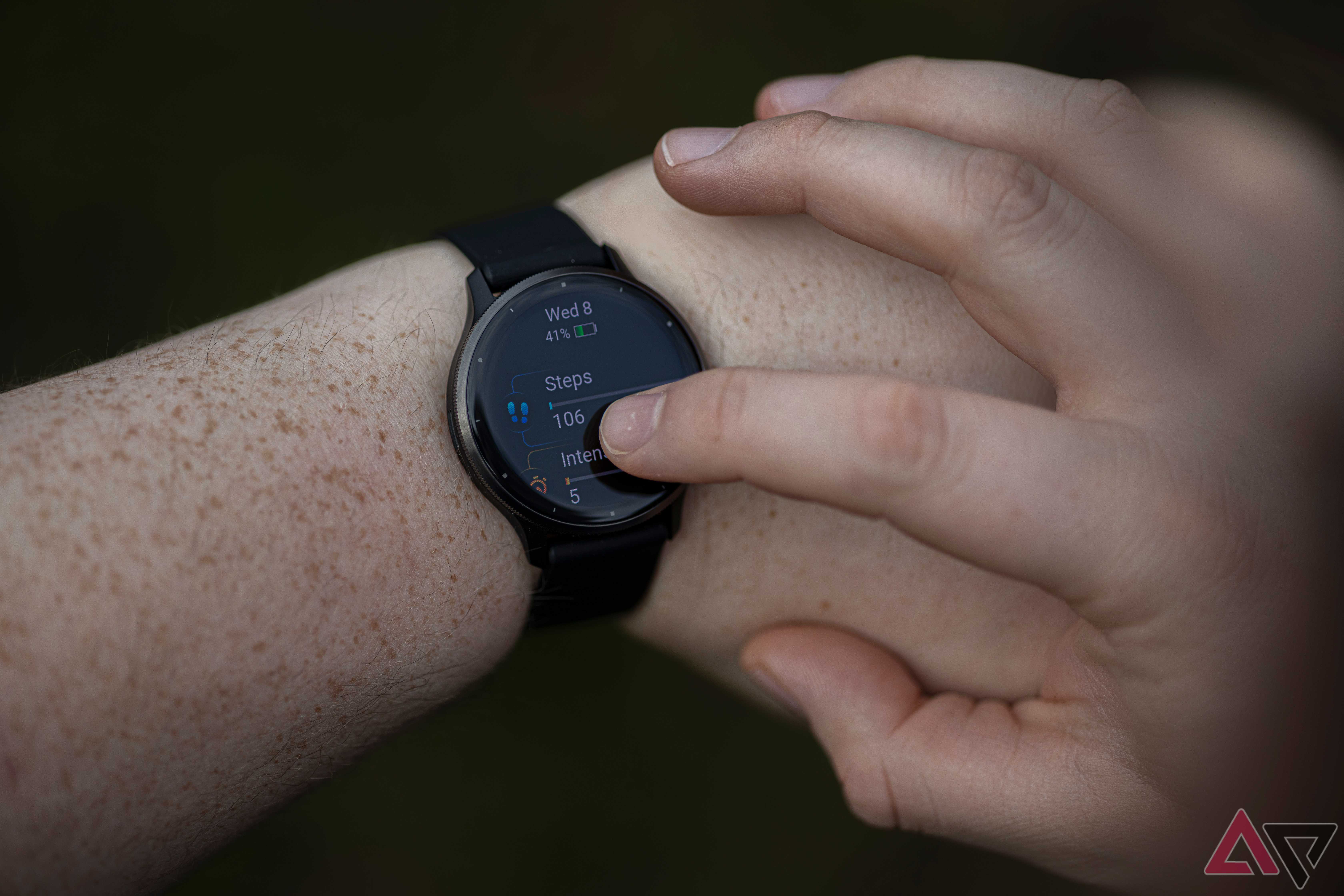 Close up of person viewing steps on Garmin Venu 3 smartwatch
