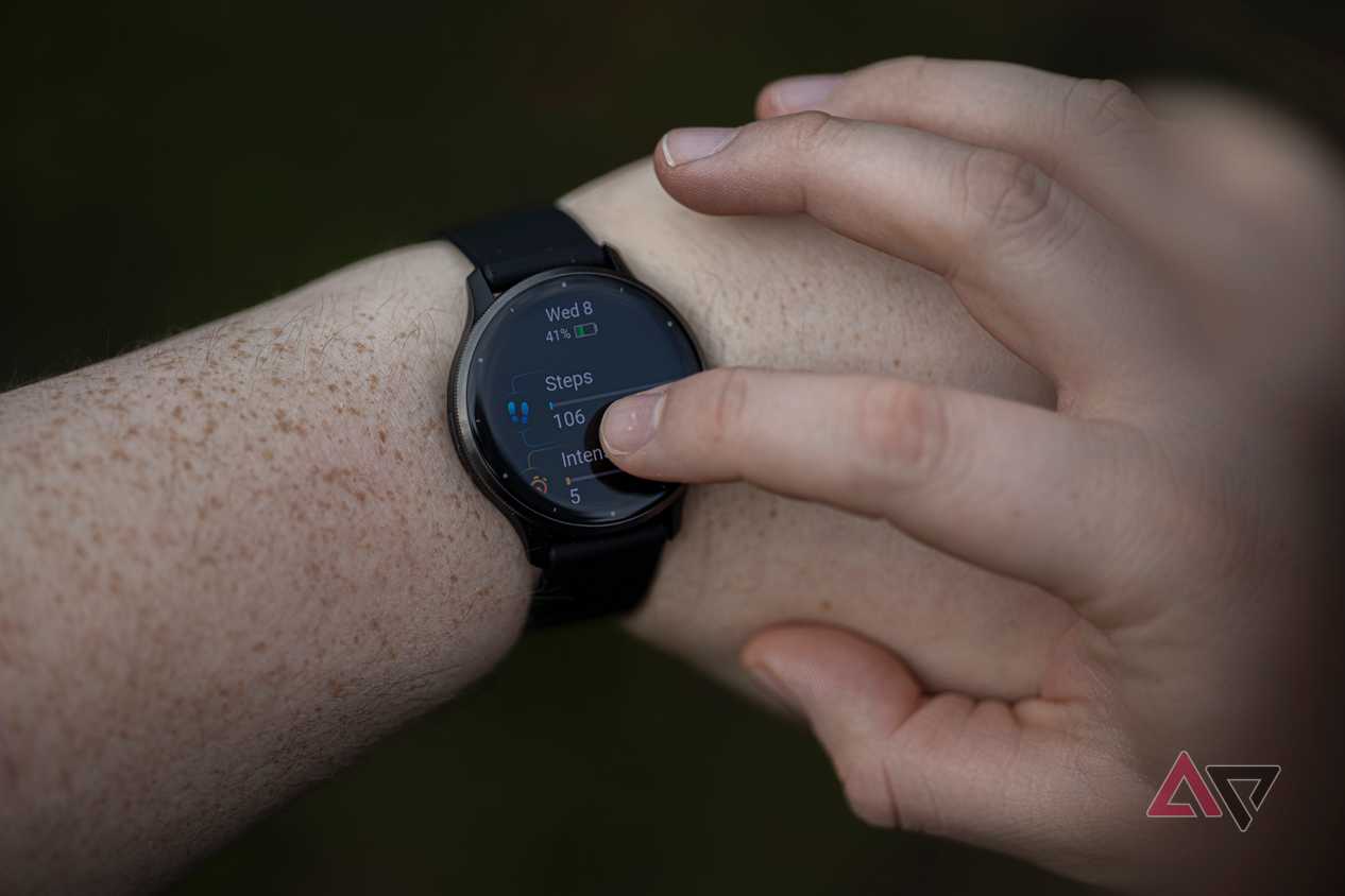 Close up of person viewing steps on Garmin Venu 3 smartwatch