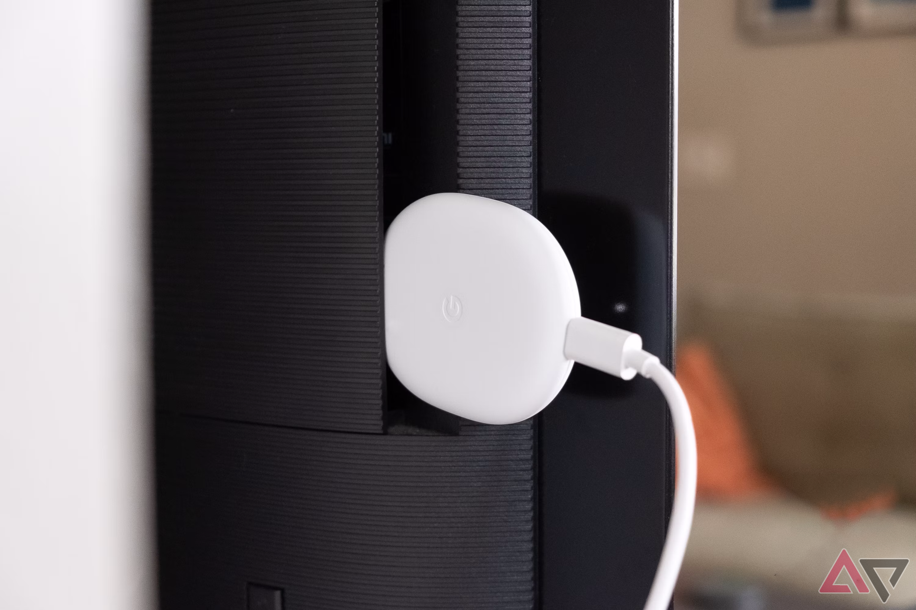 A Google Chromecast connected to a tv