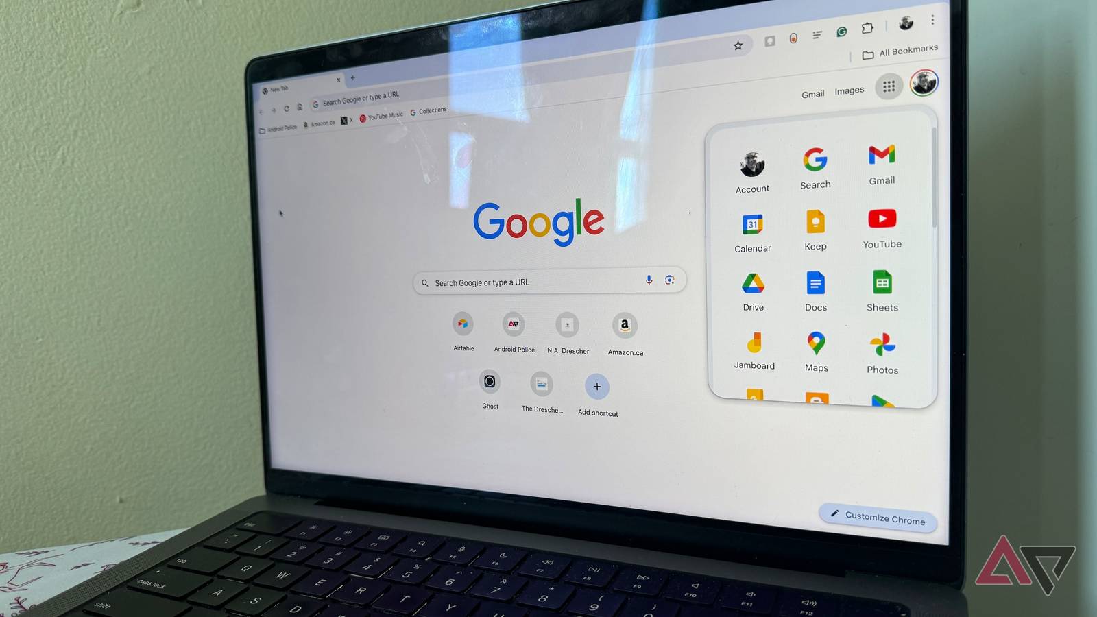 Google Chrome open on a MacBook Pro showing the Google Apps menu.