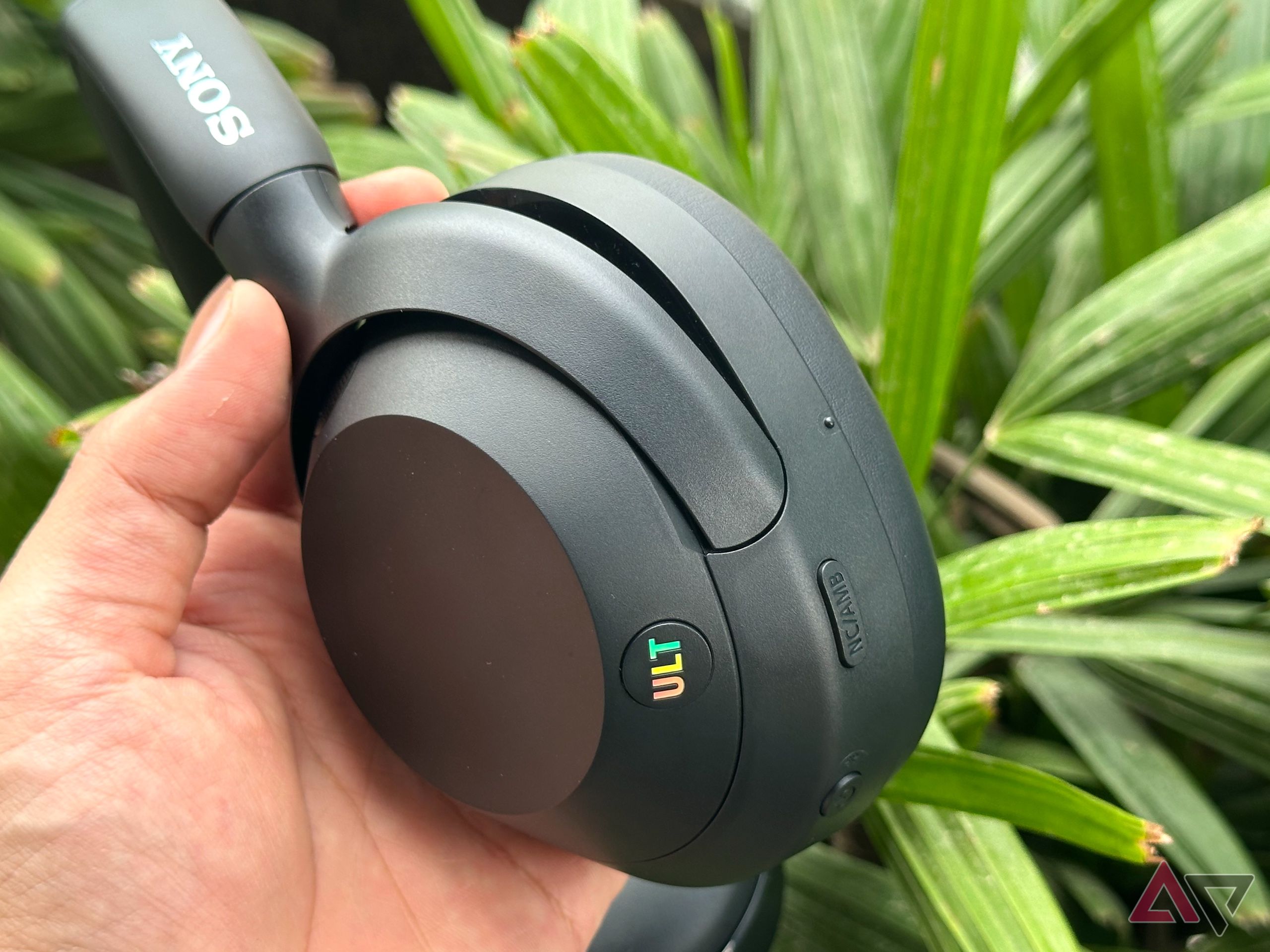 Sony Ult Wear headphones in hand
