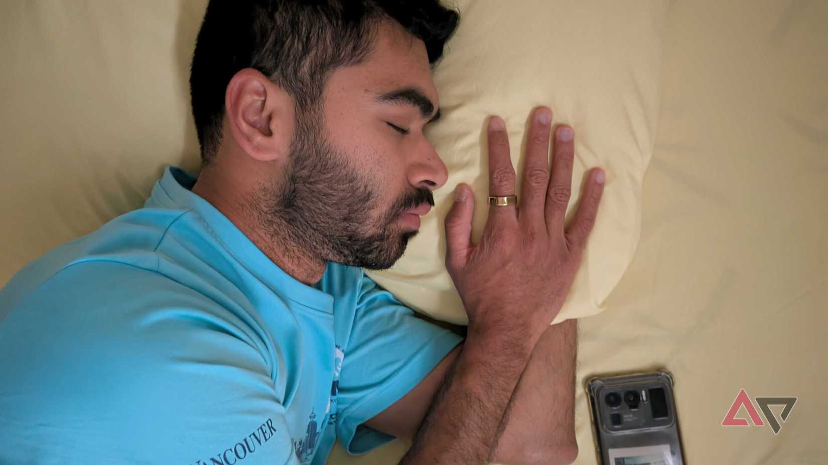RingConn Gen 2 smart ring worn on a man during sleep